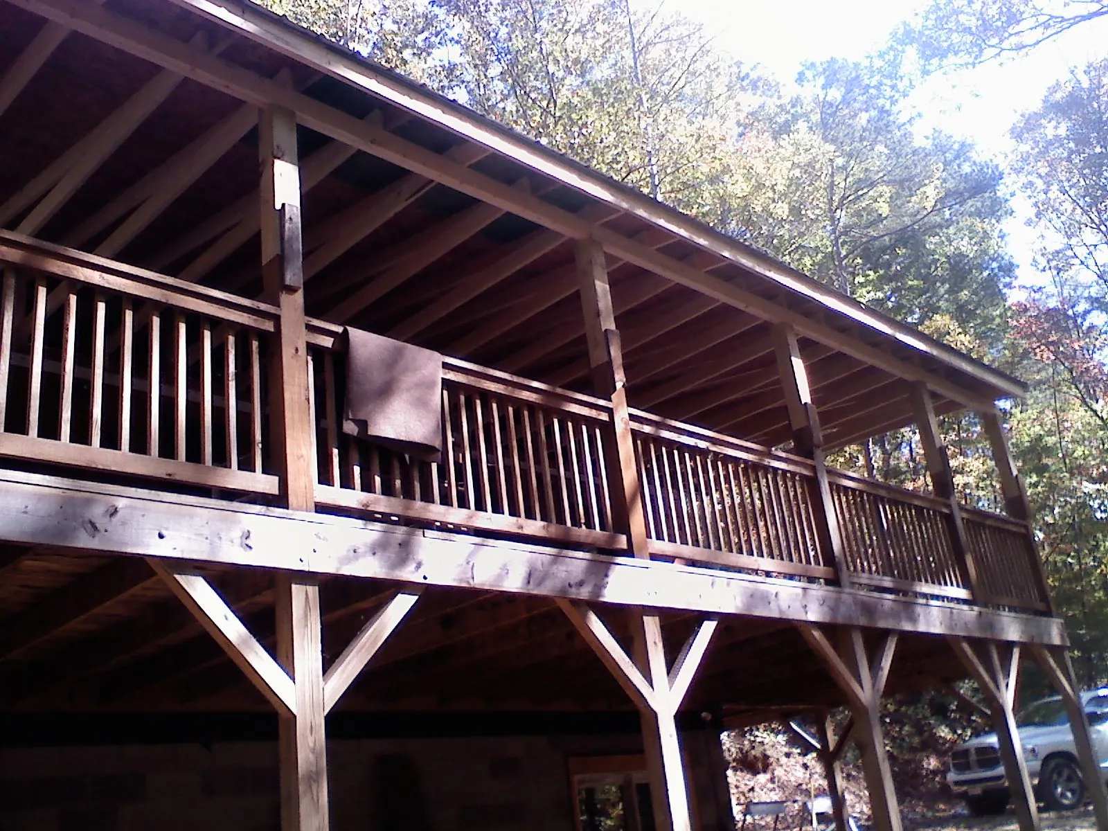 Timber framing under a new elevated porch and deck — Roof Leak Repair in Parrish by Roofing Brothers